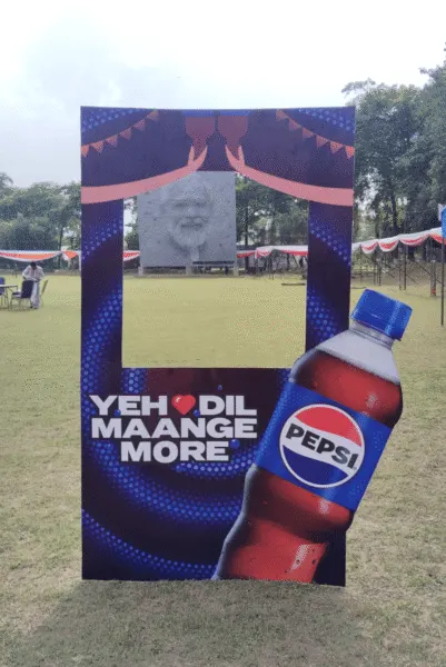 Outdoor advertising agency promotional banner for Pepsi with Navratri festive greetings.