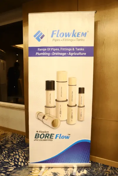Outdoor advertising agency display stand for Flowkem pipes, fittings, and tanks product promotion.