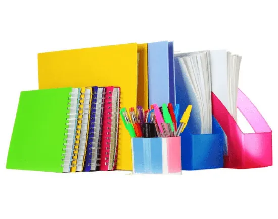 Colorful notebooks, pens, and office supplies—essential tools that complement the best marketing materials for internal branding and organization.